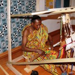 kente being hand woven in a loom